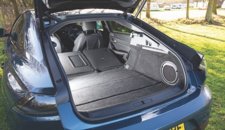 With the rear seats down, the floor is sloping