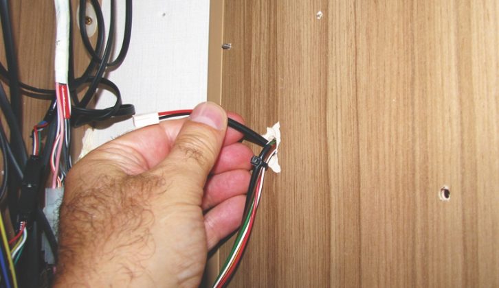 Feed the Latch Housing through the internal panel, then connect it to the control panel