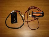 This is the completed DIY back-up unit, with two AA batteries inserted