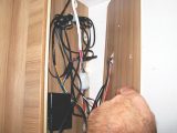 Remove the internal panel from the locker to access the wiring