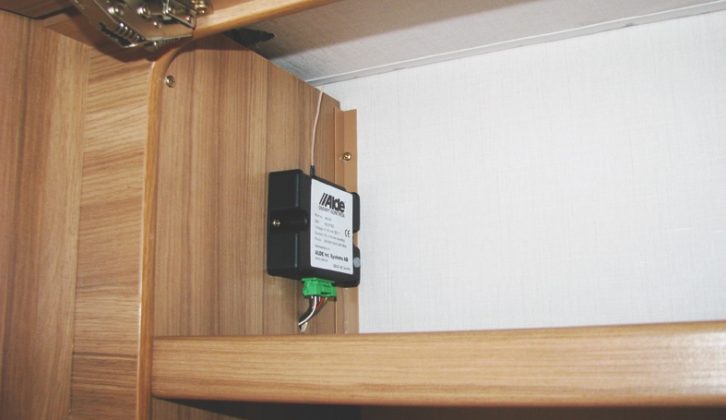 The Alde Smart Control unit inside an overhead locker