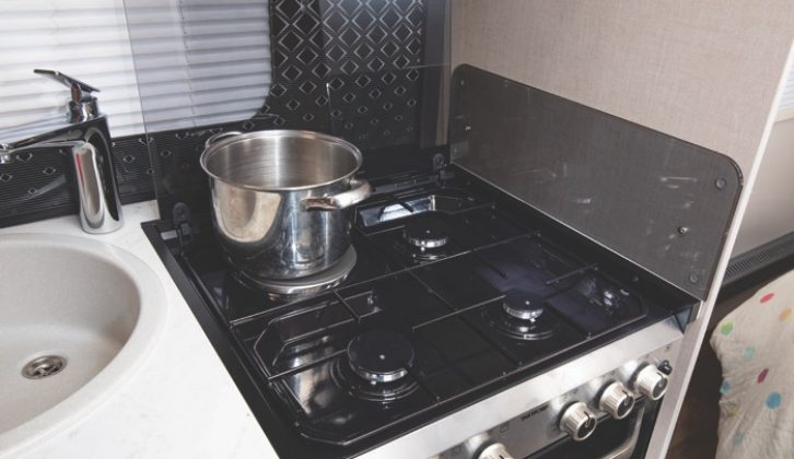 The kitchen boasts a four-burner hob so you can use either gas or electric