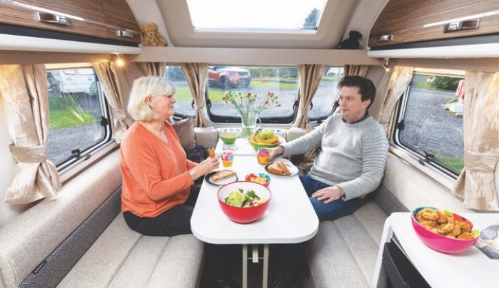 The lounge is bright and airy, with dark wood finish and light fabrics providing good contrast. The front lounge seating converts to small single beds, or easily makes up into a double with pull-out slats