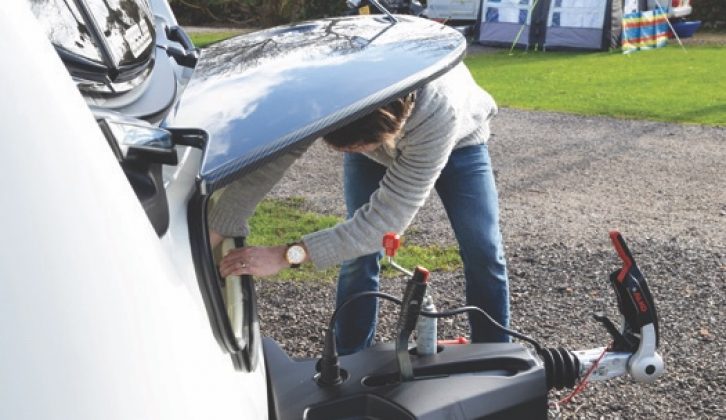 Struts keep the lid of the front gas bottle locker up for you