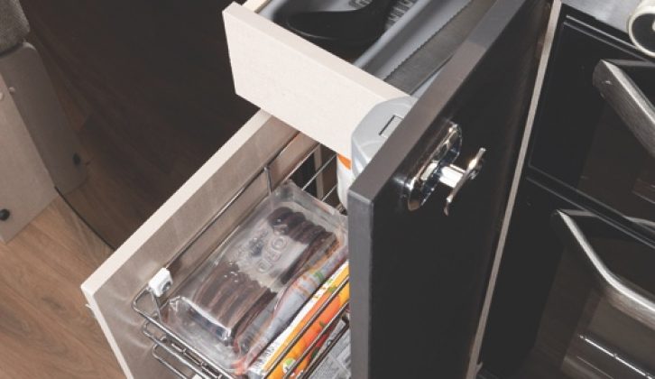Storage includes a cutlery drawer and a small cupboard
