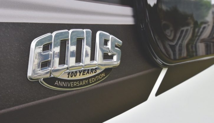 An anniversary badge marks the centenary of an icon