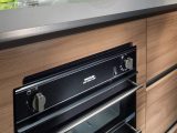 The Alpina's kitchen features a handy combined oven and grill