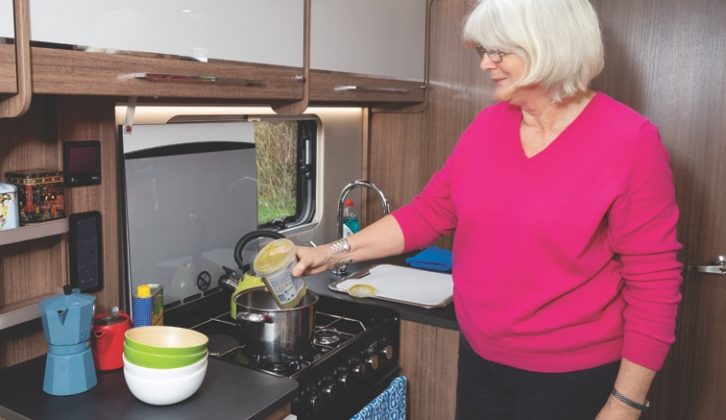 The bright, well-equipped kitchen provides impressive workspace, with classic Bailey touches, including the wooden cover for the four-burner dual-fuel hob