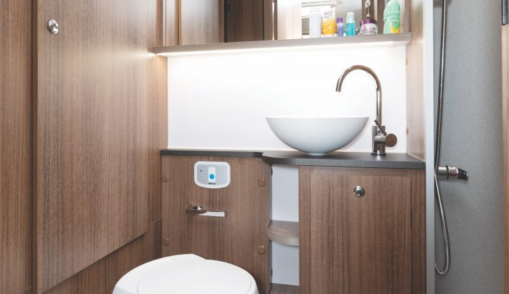 The Merida provides a very smart full-width washroom across the rear of the van, with a stylish salad bowl handbasin, an elegant swan-neck tap, a brightly lit mirror and lots of storage space