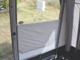 The side panels are interchangeable, so you can choose door positions