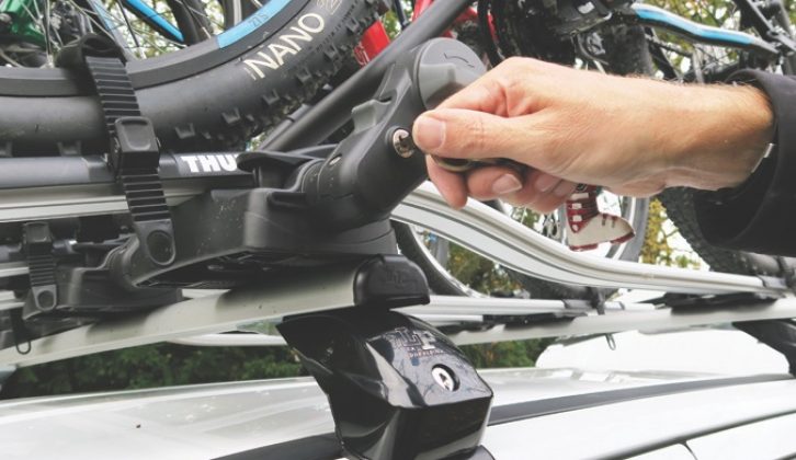 Frame-holding racks offer more security - an arm attaches to the bike frame, straps secure the wheels