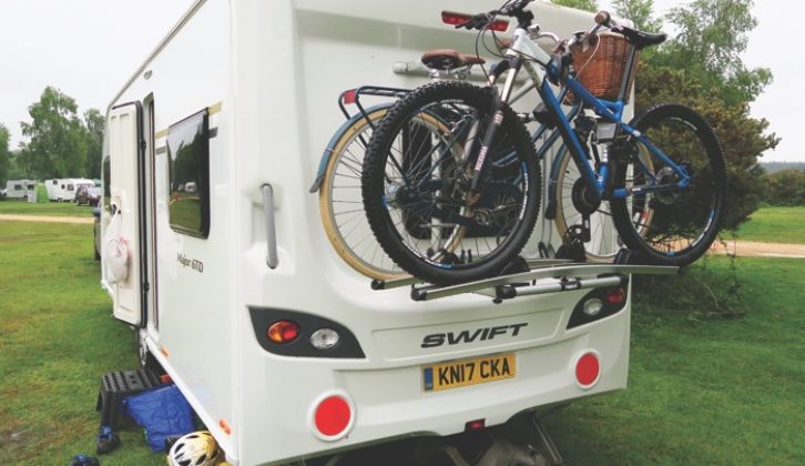 It is viable to mount bikes to the rear of a van, but not ideal, owing to weight issues