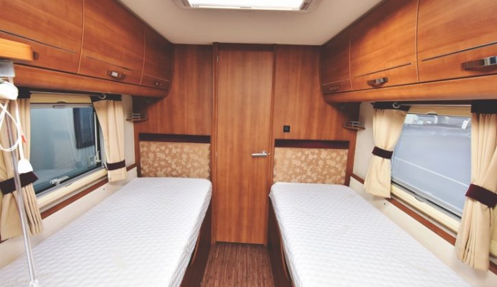 The twin fixed beds have memory foam mattresses; slats are used to make up the front double bed