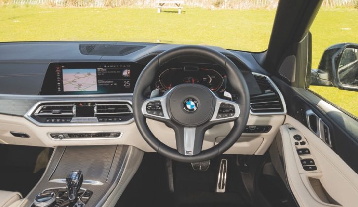 There are no conventional dials, but there is a high-resolution screen instead, and there are paddles behind the steering wheel for changing gear, but we rarely felt the need to use them