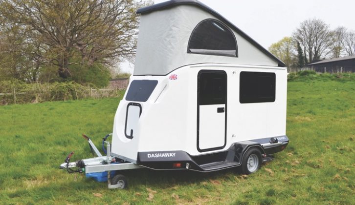 The electrically operated roof is raised via a switch by the door