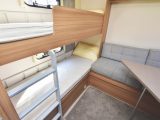 Each bed in the fixed bunk has its own window