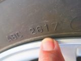 The age of your tyres can be found by checking the four-digit code on its sidewall. This tyre, for example, has the code '2617', which means it was manufactured in the 26th week of 2017, or June of that year