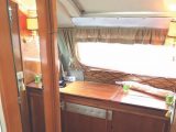 The furniture had to be built from scratch during the retoration process as the caravan had previously been used as a chicken shed!
