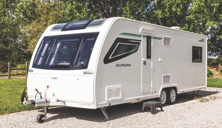 That snazzy side window you can see at the nearside front is actually a fake, so the interior wall is left free for placing the TV