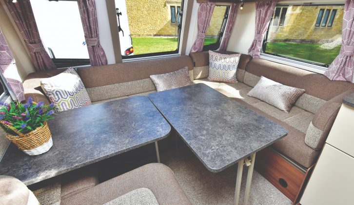 Up to six people could dine in comfort, but there's no backrest for the end seat. Meanwhile, overhead storage is good, with integral lighting above