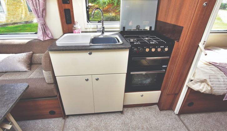 There's not much work surface in the kitchen, but we like the large sink and the LEDs