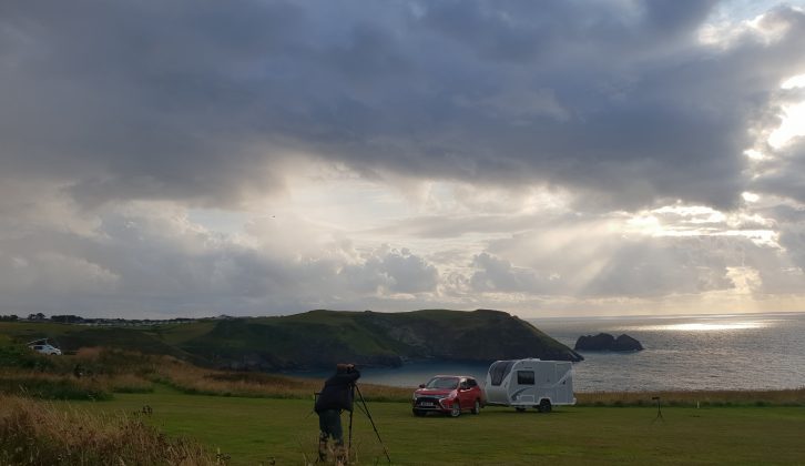 Dramatic skies over the camping field at Trewethett Farm, looking out towards The Sisters