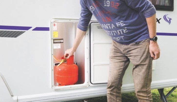 The gas bottle locker is located at the side of the caravan