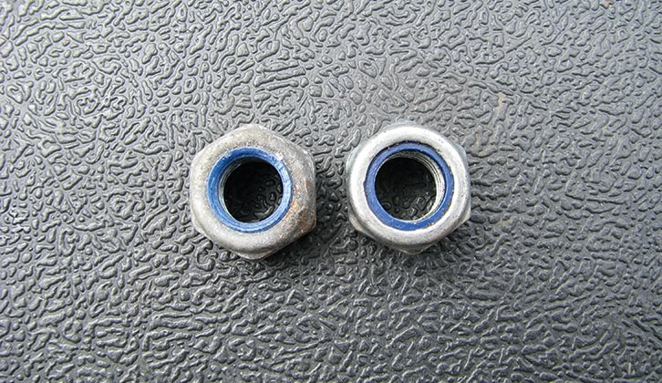 Use new Nylock nuts (used ones on the left, new on the right)