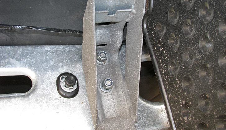 Washer and Nylock nut on bolts