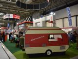 There is plenty going on at The Camping and Caravanning Club's stand, with this bustling members' area