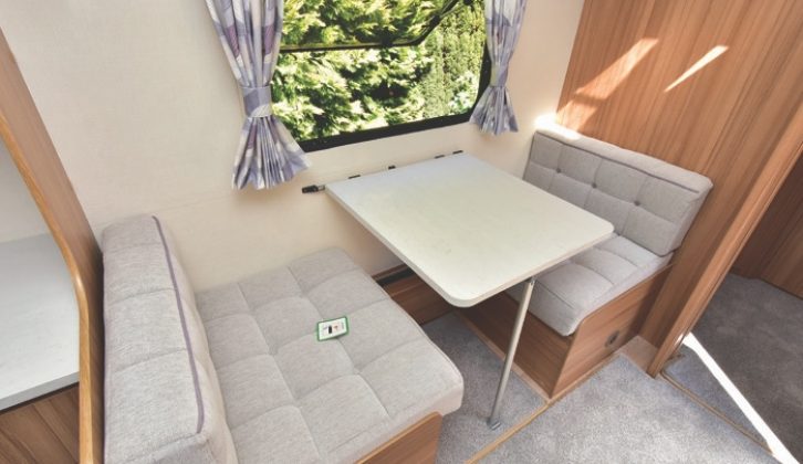 To make the single bed from the dinette, you simply use the clip-on table to bridge the gap