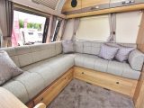 The L-shaped lounge in the 454 offers great space and comfortable seating for a couple
