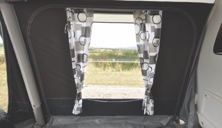 Zip-out side panels have large windows with smart curtains