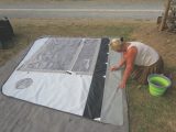 Lay out side panels on groundsheet to make them easier to clean