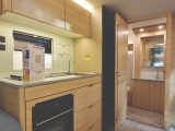 The kitchen has excellent storage capacity and is fitted with a slimline fridge/freezer