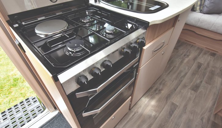 The kitchen is well equipped and comes with a dual-fuel hob and a microwave