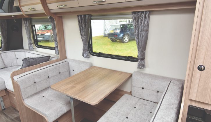 The side single dinette is sizeable enough for two adults at meal-times, and also makes up into a third bed if needed