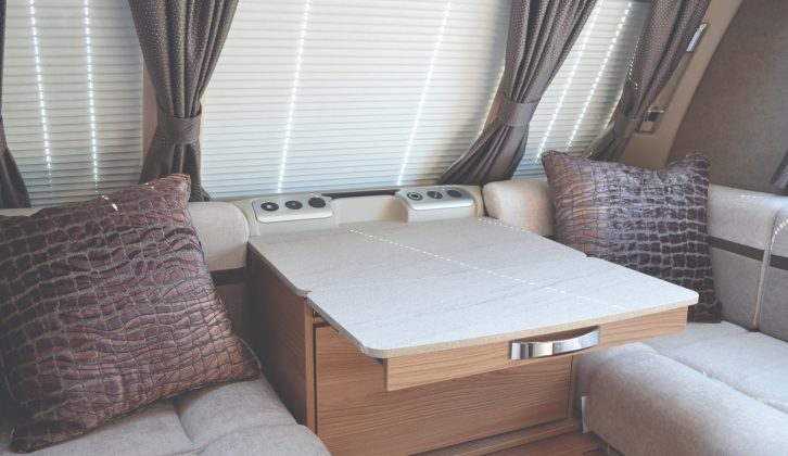 Parallel settees easily convert to single beds, but making up double involves pull-out slats