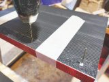 Tape angles in place before drilling through and riveting