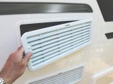 Begin the installation by removing the fridge vents