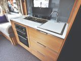 There are no kitchen cupboards, but you do get three large drawers, a three-burner gas hob, an oven/grill and a microwave