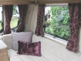 It is not uncommon to find the curtains complementing the caravan's soft furnishings, such as the cushions and upholstery
