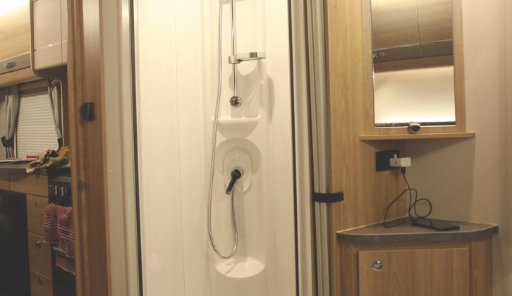 The en-suite washroom has a reasonably spacious, well-appointed shower cubicle
