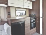 The side kitchen offers plenty of storage options and provides excellent night-time illumination