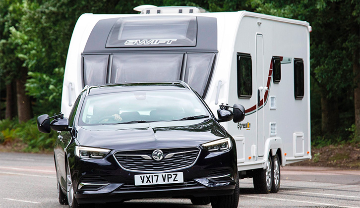 The Vauxhall Insignia Sports Tourer towing a caravan