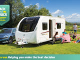 A caravan parked up on grass