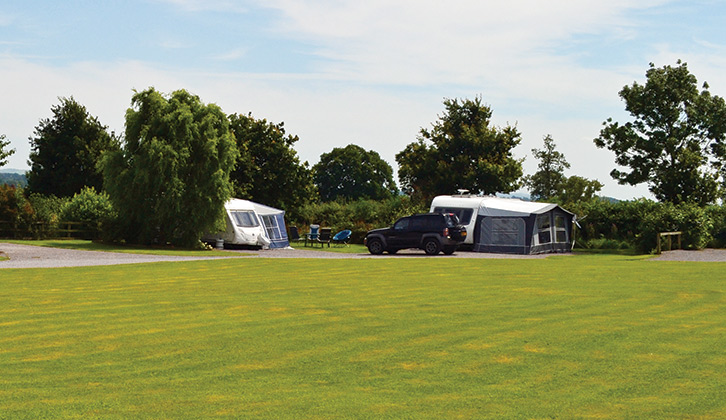 Two pitched up caravans at Old Oaks Touring Park