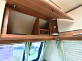 Radio/CD player is neatly housed in the front offside overhead locker; all of the lockers offer lots of storage