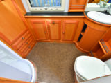 Capacious end washroom offers the added benefit of excellent storage and plenty of room for dressing