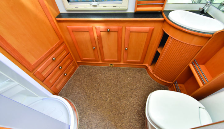 Capacious end washroom offers the added benefit of excellent storage and plenty of room for dressing